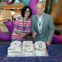 Picture of Winita and Bob cutting the cake